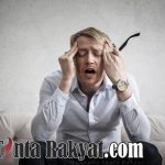 photo of man touching his head 3752834