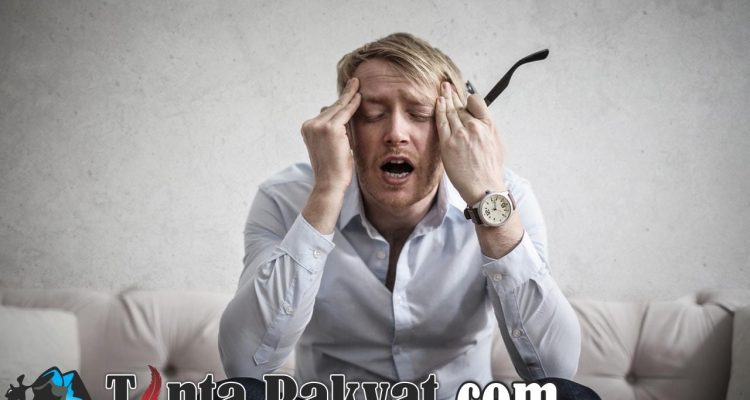 photo of man touching his head 3752834
