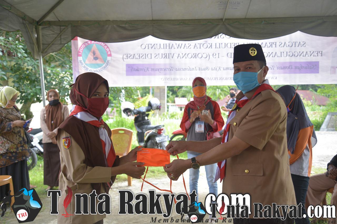 Kwarcab Pramuka Sawahlunto Berikan Bantuan Sembako